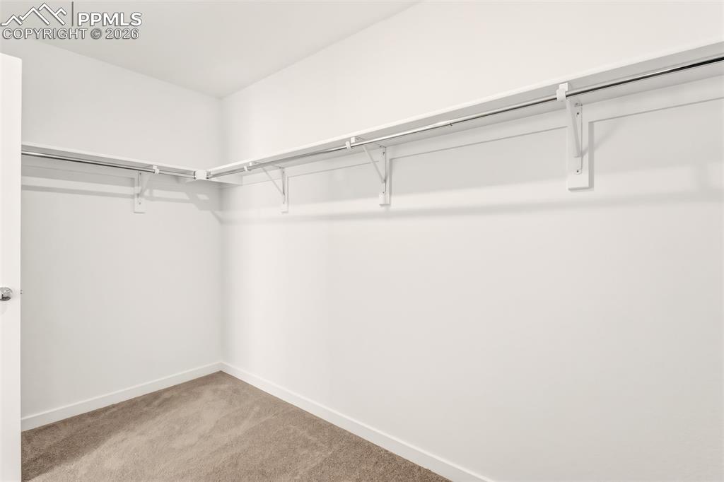 Image 33 of 35: walk-in closet in Primary