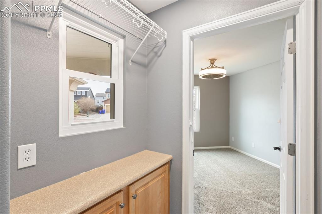 Image 11 of 21: walk-in closet