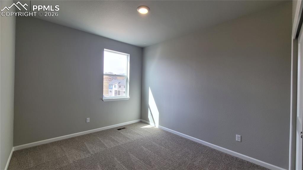 Image 16 of 29: Another View of 2nd Bedroom on Upper Level! 