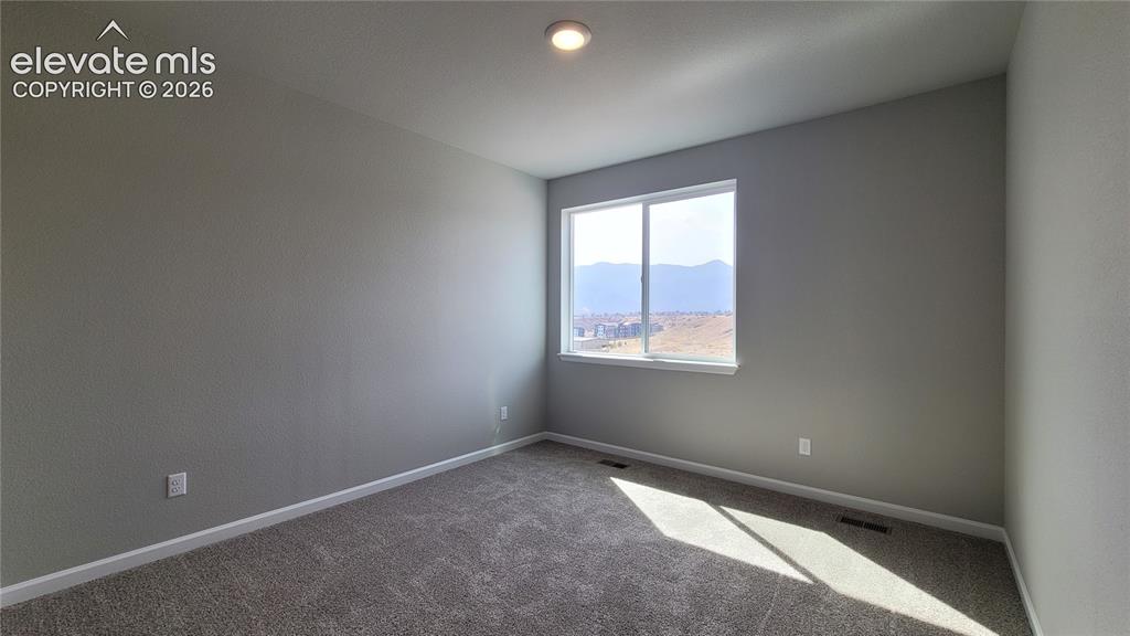 Image 18 of 36: 2nd Bedroom on upper level!