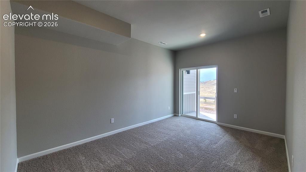 Image 26 of 36: Family Room with walk-out to patio!