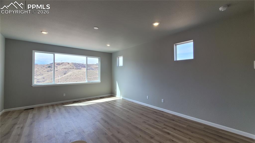 Image 4 of 29: Entry with coat closet, LVP Flooring, and Garage Entry! 