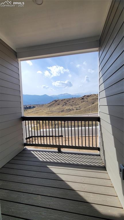 Image 9 of 29: Dining area with LVP flooring and walks out to composite deck! 