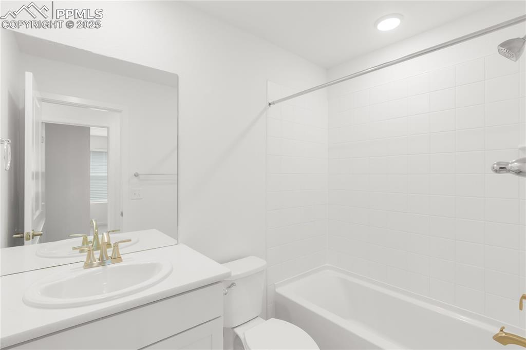 Image 15 of 39: Full bath with vanity and shower / bathtub combination