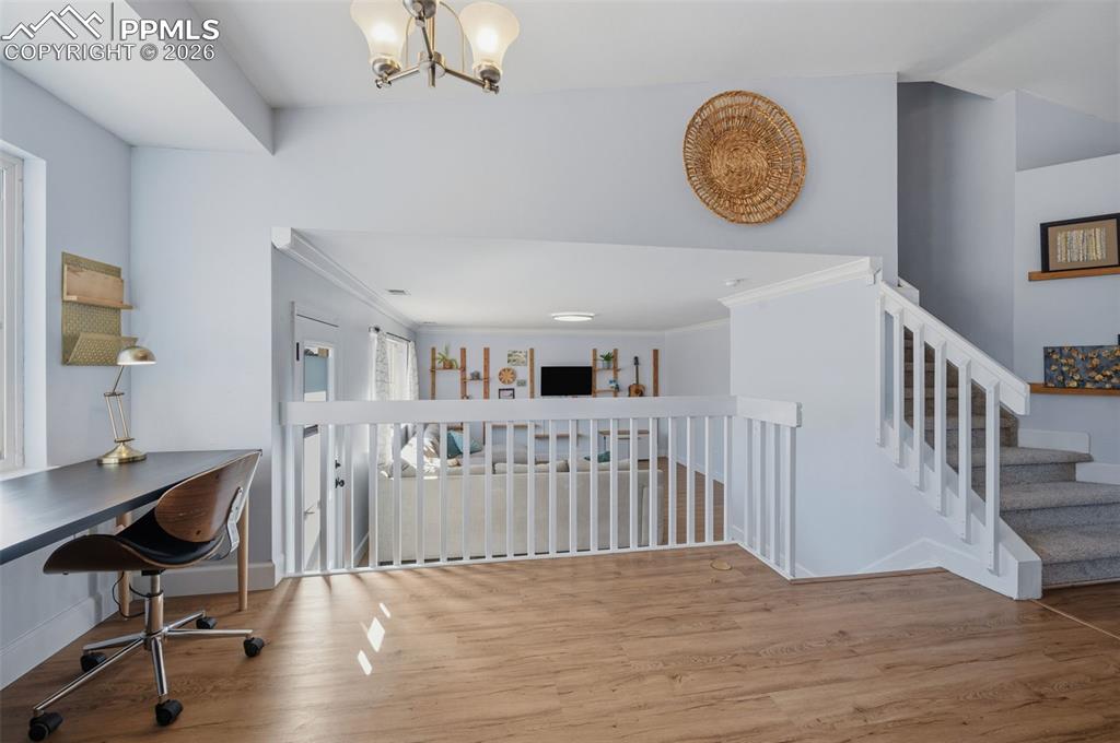 Image 14 of 50: Kitchen area currently being used as office or can hold a kitchen table