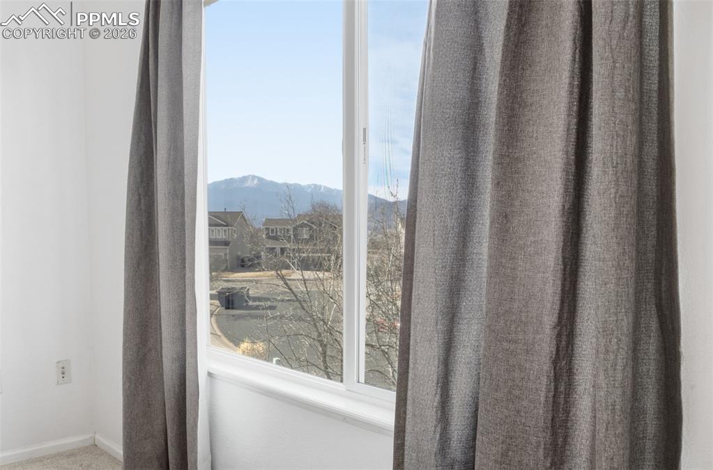 Image 20 of 50: Primary Bedroom Mountain Views