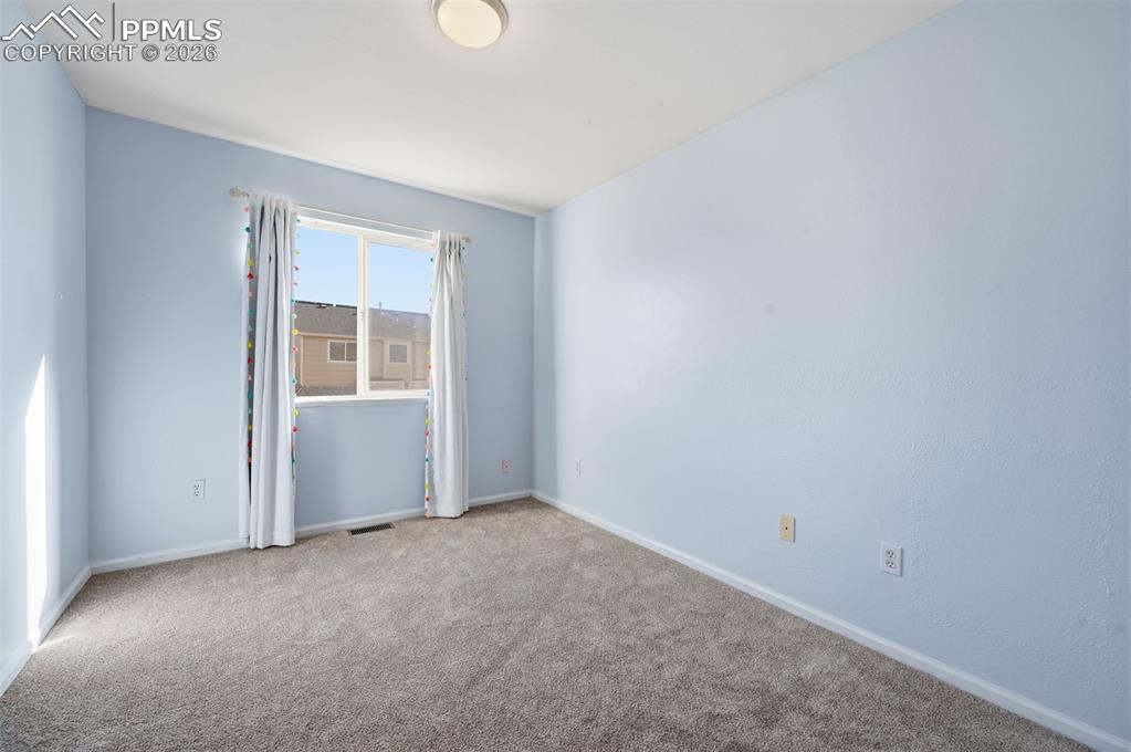 Image 26 of 50: Upper Bedroom