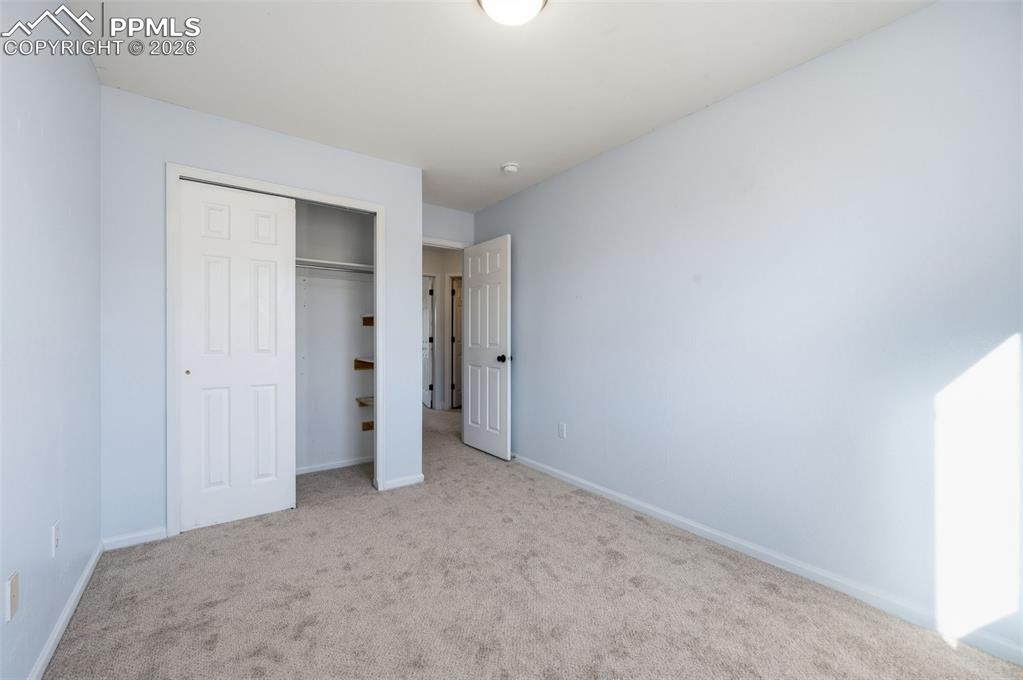 Image 27 of 50: Upper Bedroom