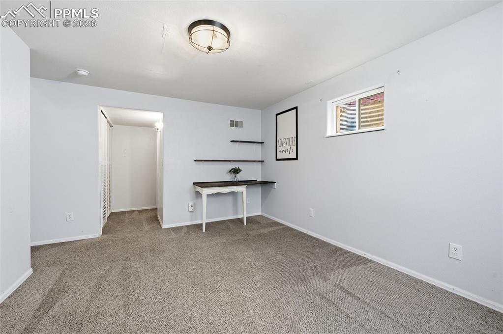 Image 32 of 50: Lower level Family Room/Bedroom/Media Room