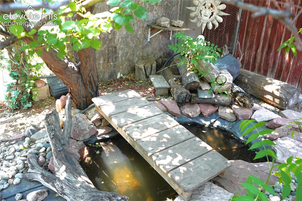 Image 18 of 19: pond with waterfall (not on)