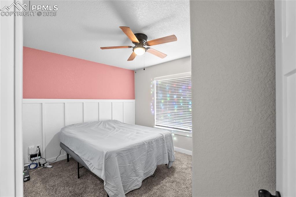 Image 19 of 31: second bedroom on main level