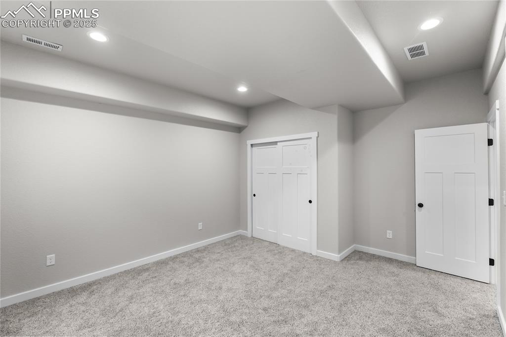 Image 27 of 31: fourth bedroom in basement 