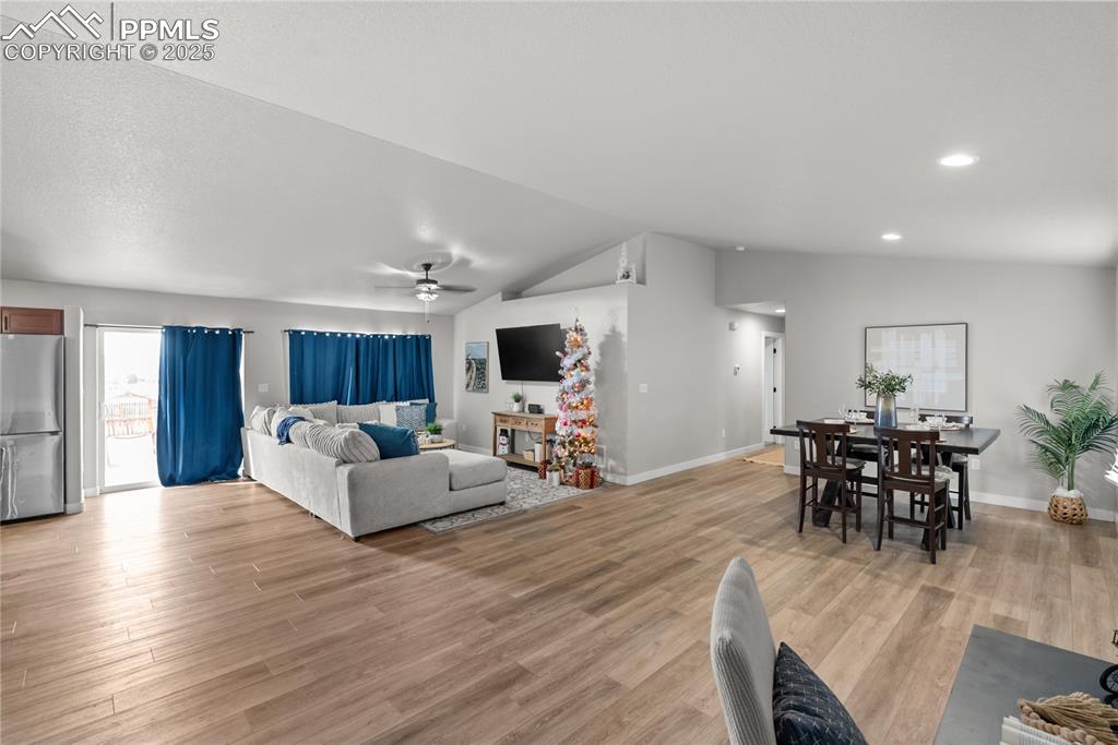 Image 8 of 31: full view of dining and living room