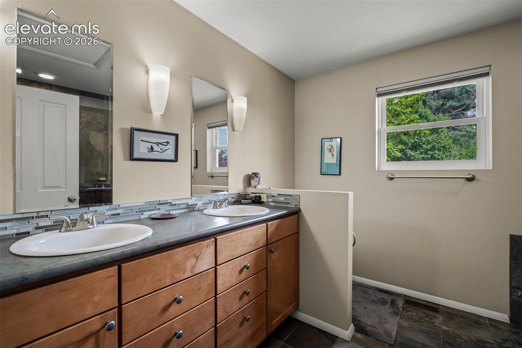 Image 20 of 50: Master Bathroom