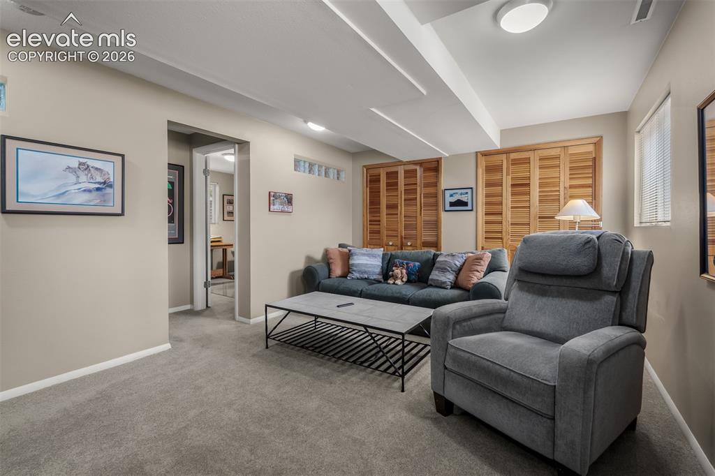 Image 41 of 50: Lower level family room