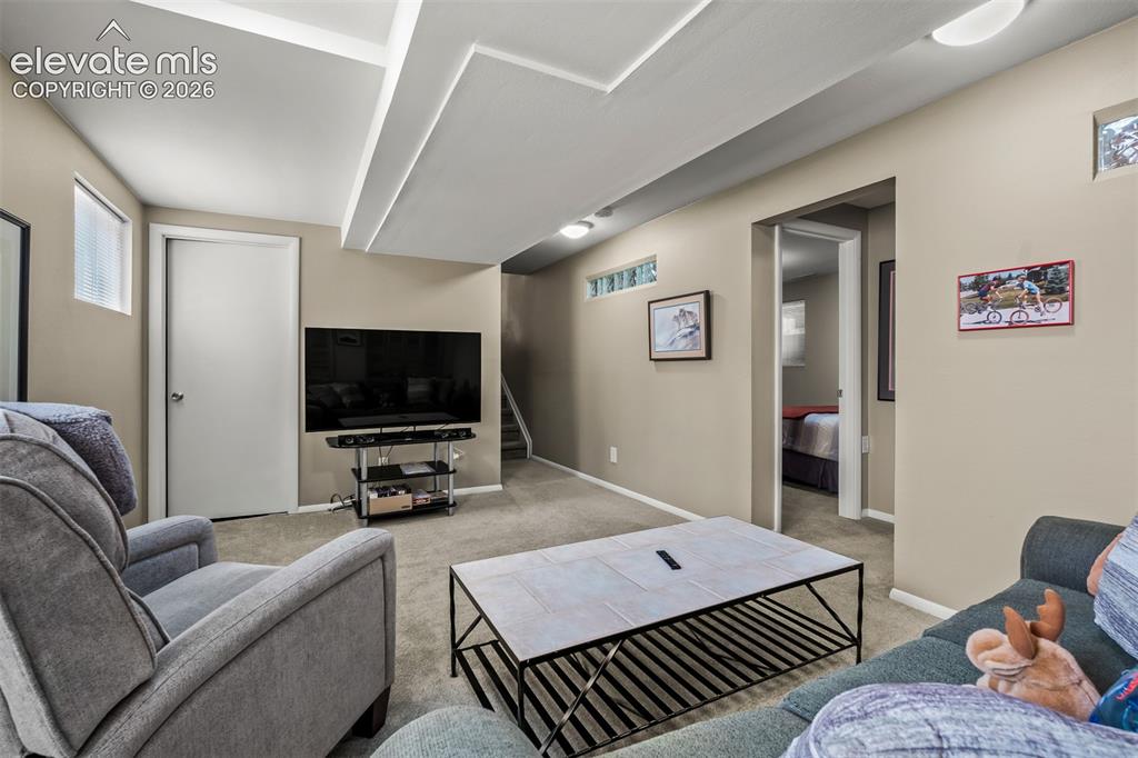Image 42 of 50: Lower level family room