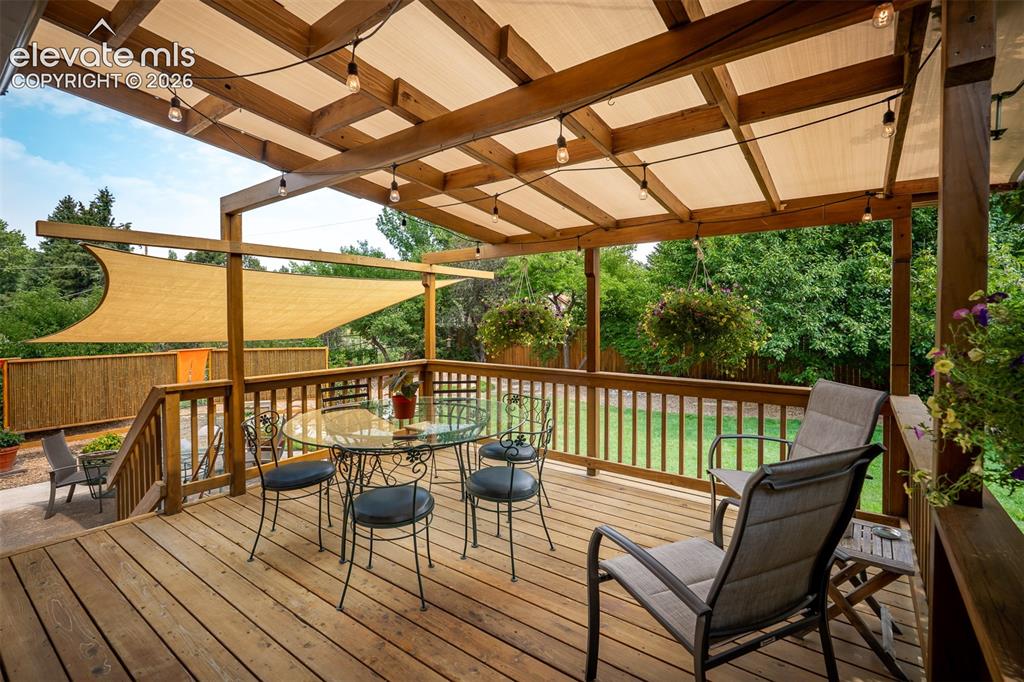 Image 49 of 50: Covered deck off the Kitchen