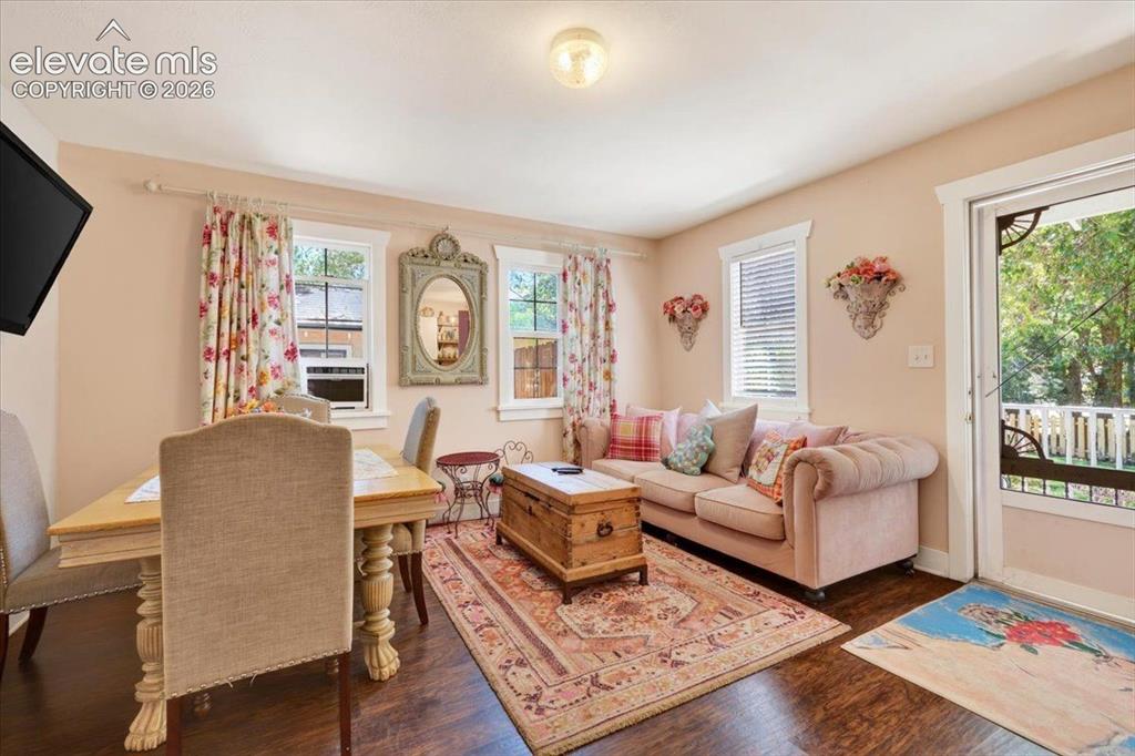 Image 20 of 50: Monet Cottage Living & Dining Area – Inviting living and dining area offeri