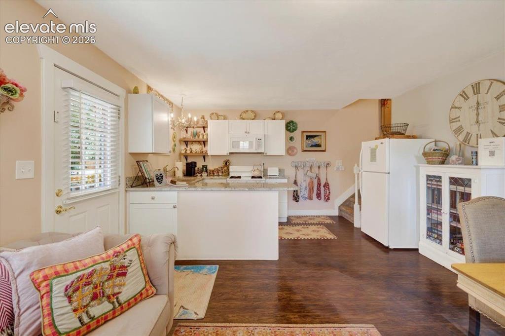 Image 21 of 50: Monet Cottage Open Living & Kitchen – Open-concept living and kitchen area