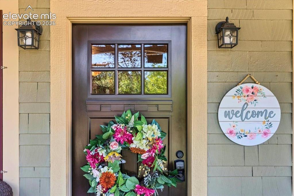 Image 3 of 50: Inviting Front Entry – Welcoming entrance highlighted by Craftsman details,