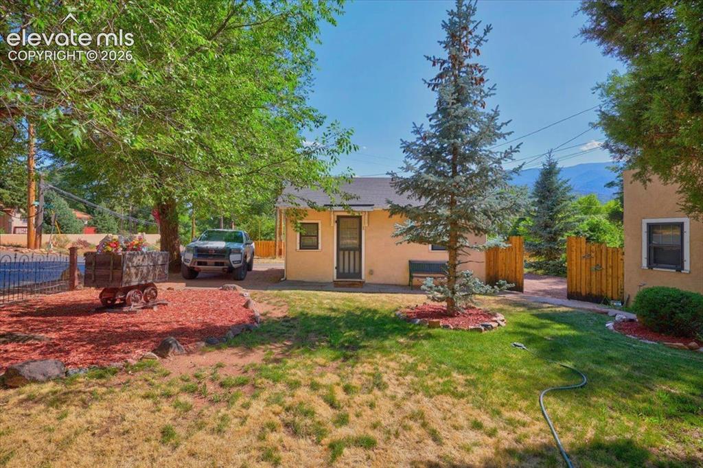 Image 34 of 50: Cottage #1 Exterior – Charming cottage with private entrance, landscaped su