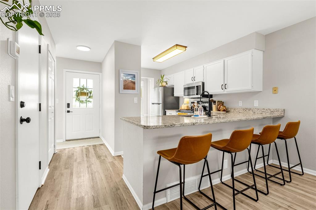 Image 3 of 30: Open concept kitchen
