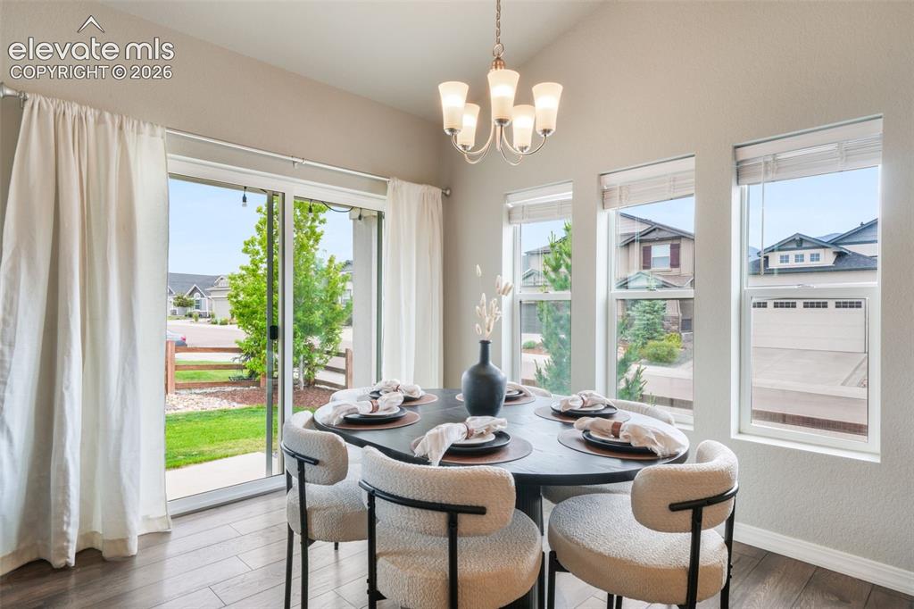 Image 14 of 49: Dining area featuring LVP