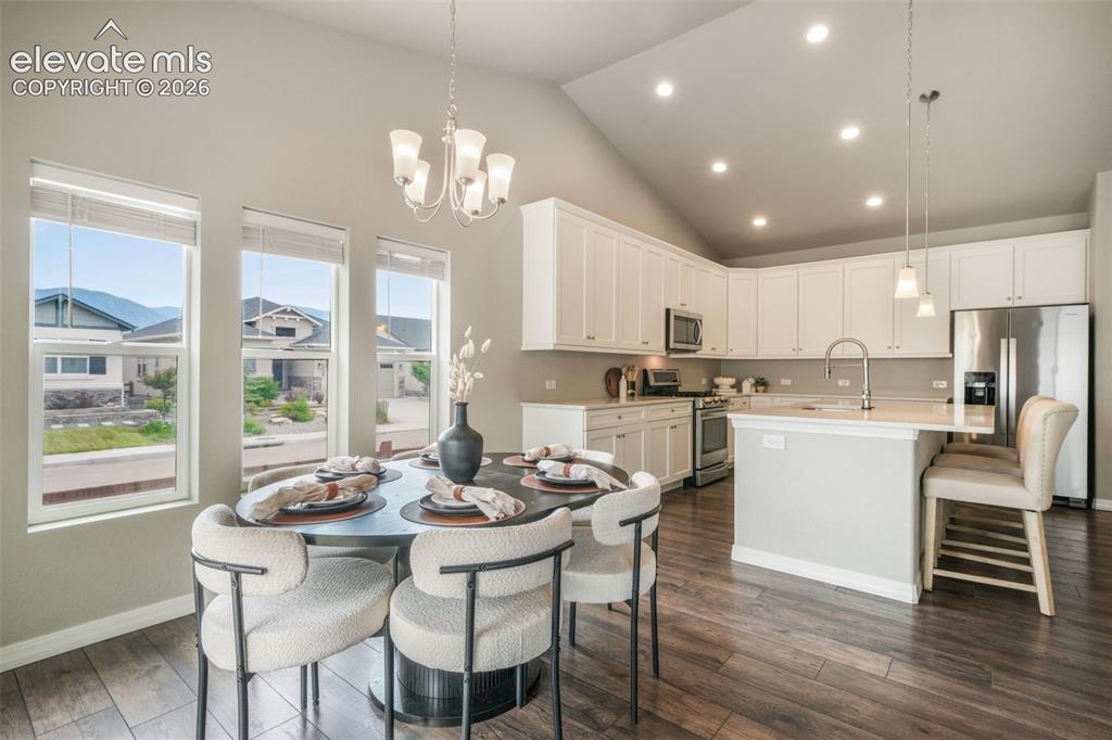 Image 15 of 49: Open-concept kitchen with LVP