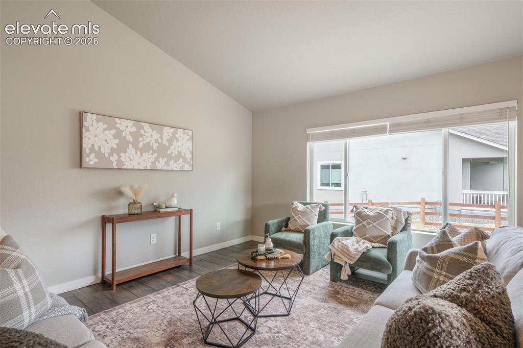 Image 19 of 49: Vaulted ceilings complement the neutral wall tones