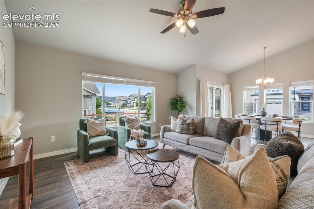 Image 20 of 49: Open-concept living area featuring LVP