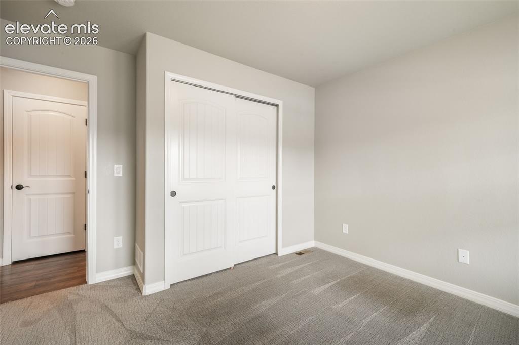 Image 30 of 49: Neutral tone walls, white trim