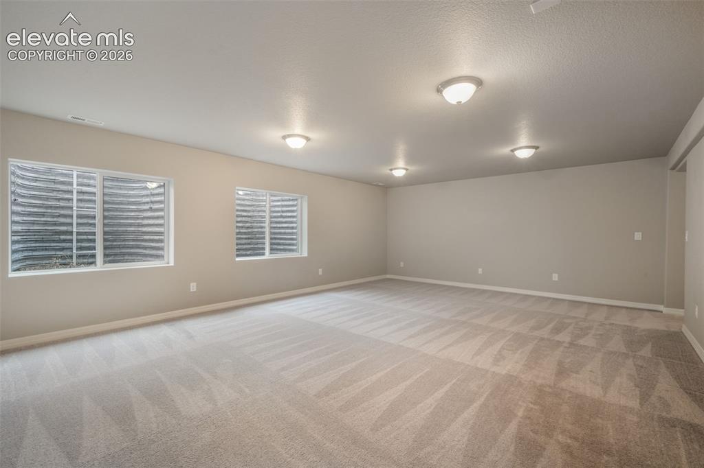 Image 36 of 49: Spacious family room