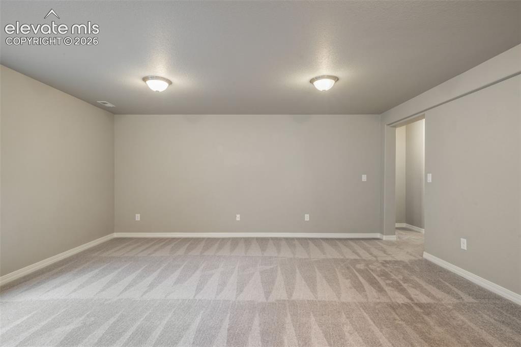 Image 38 of 49: Spacious family room