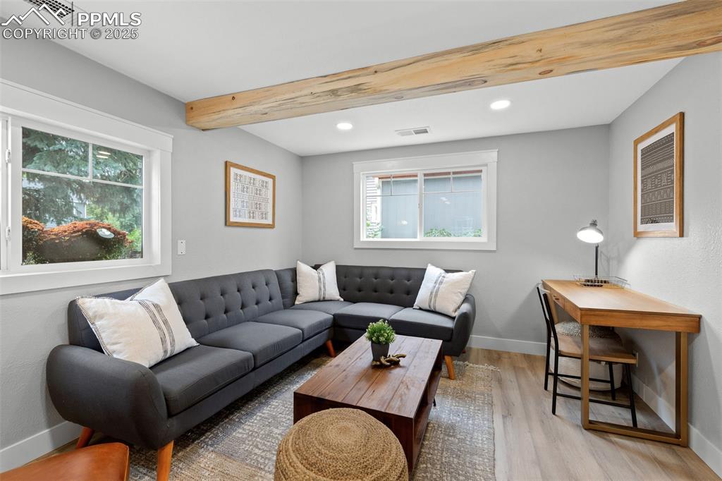 Image 10 of 15: Cozy living area with tons of natural light