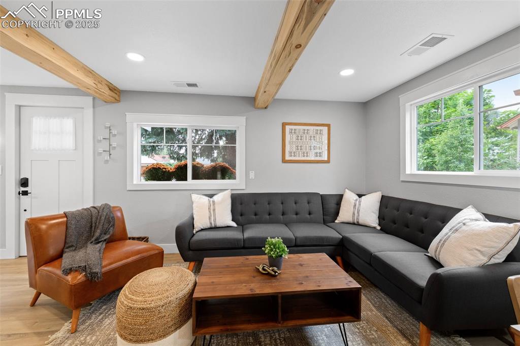 Image 5 of 15: Open and inviting living room