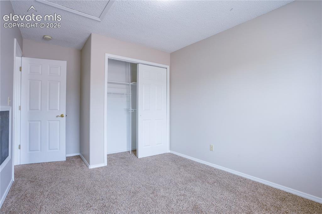 Image 13 of 39: Bedroom