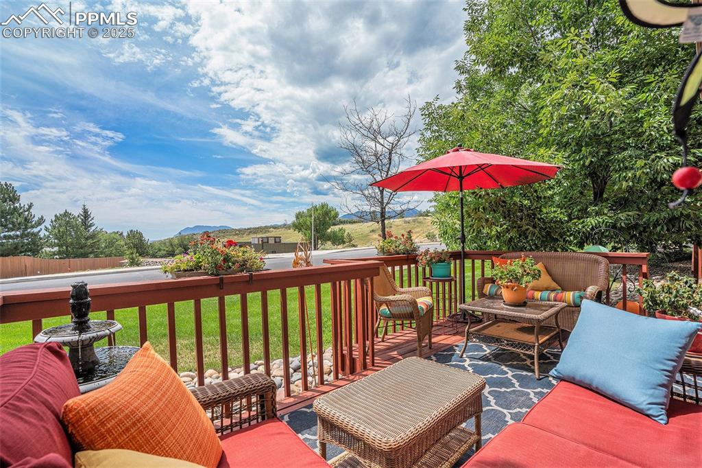 Image 19 of 23: Outdoor living space/deck which was extended to create an even more invitin