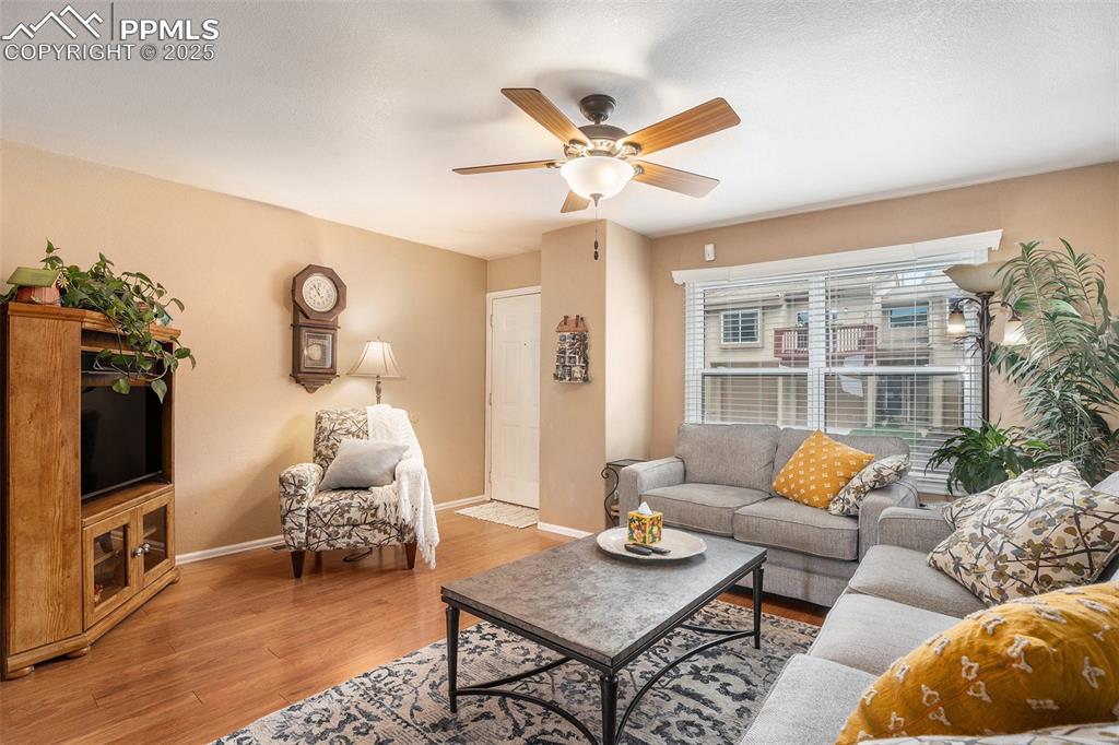 Image 4 of 23: Living area featuring light and bright area