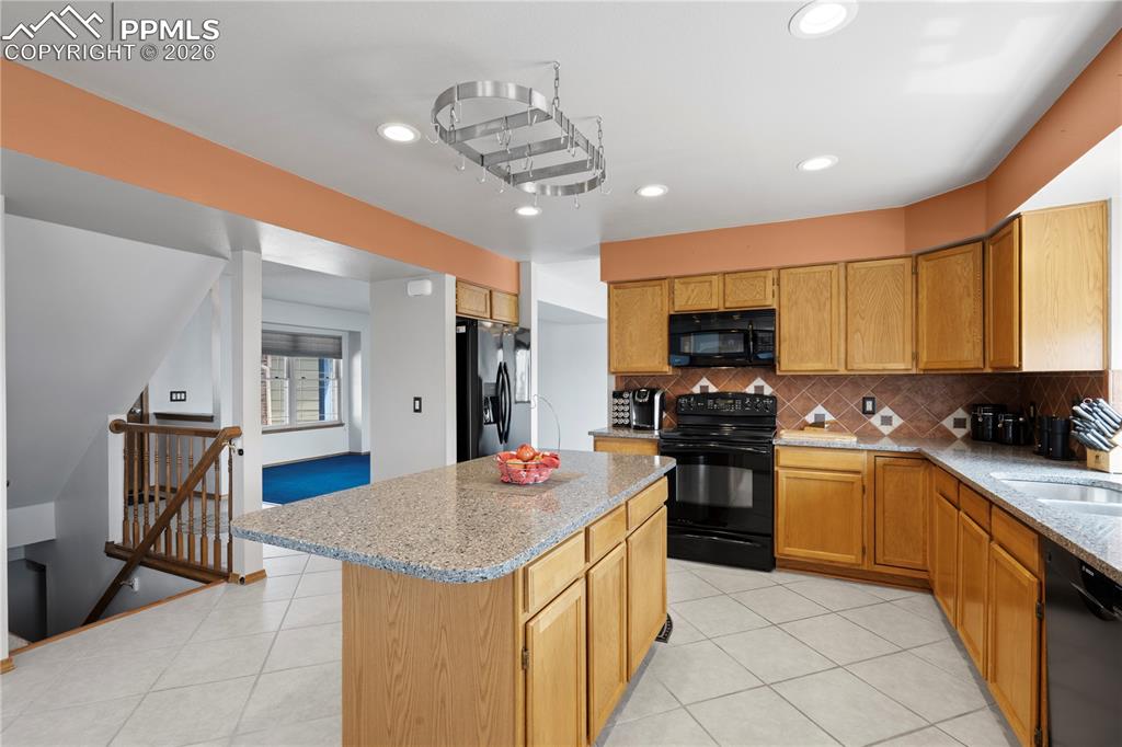 Image 12 of 46: View of Kitchen from living room area