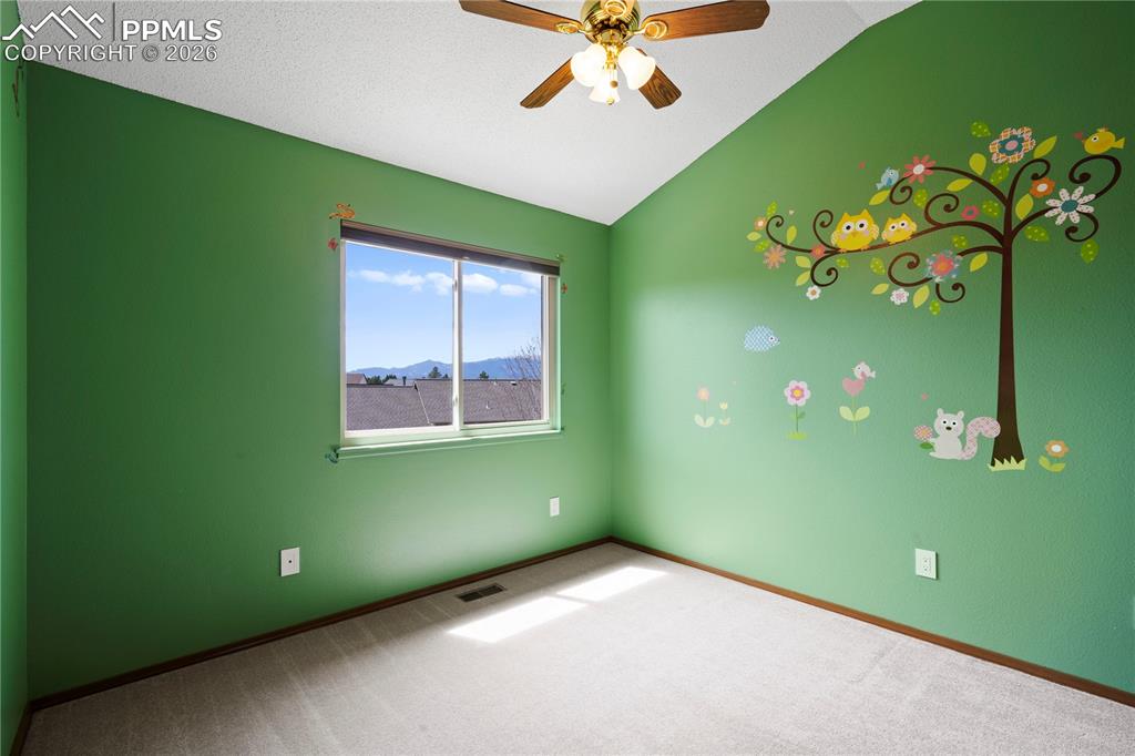 Image 25 of 46: Bedroom/Nursery, carpeted flooring, and a ceiling fan with integrated light
