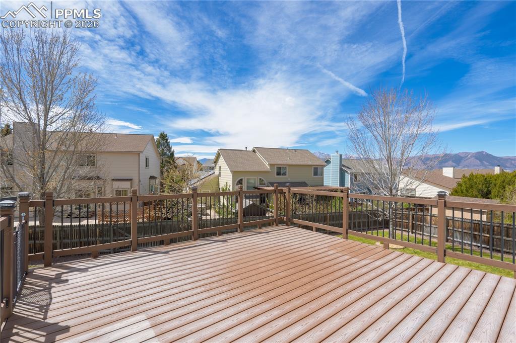 Image 41 of 46: Expansive outdoor deck with offering mountain views