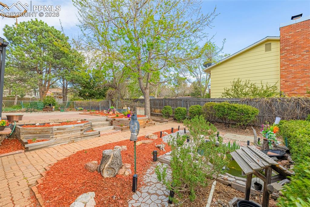 Image 37 of 45: Garden area-backyard