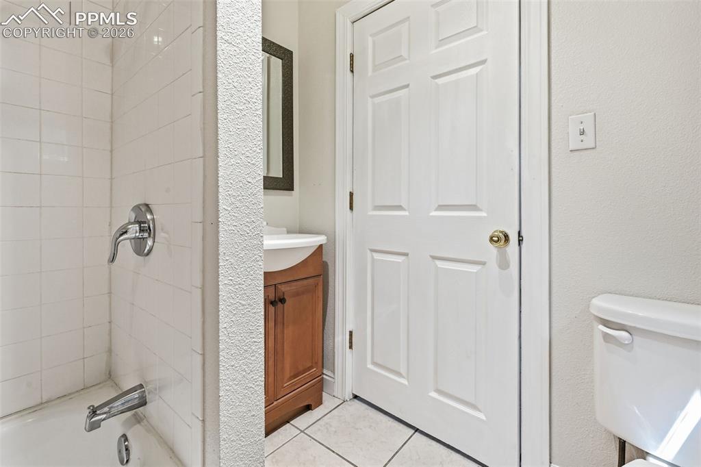 Image 17 of 34: 2nd Bath & Laundry