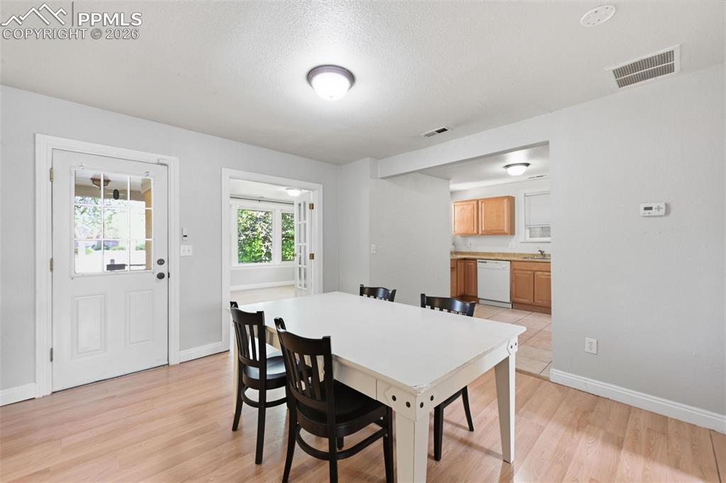 Image 5 of 34: Large dining area off kitchen