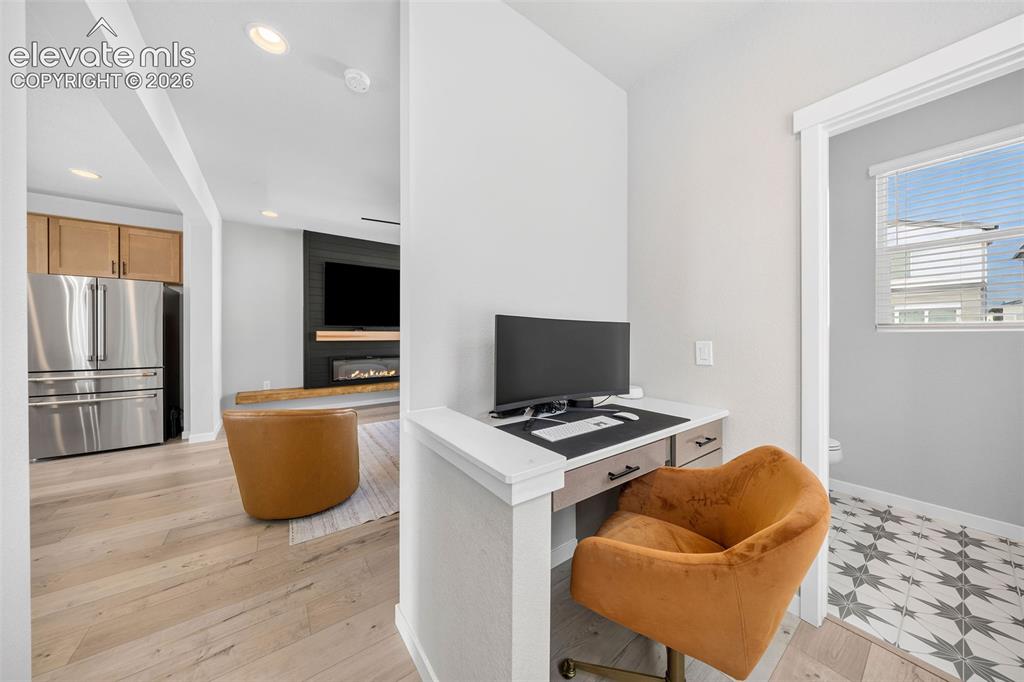 Image 20 of 48: WFH? NP. This office space on the main floor has easy access to the living