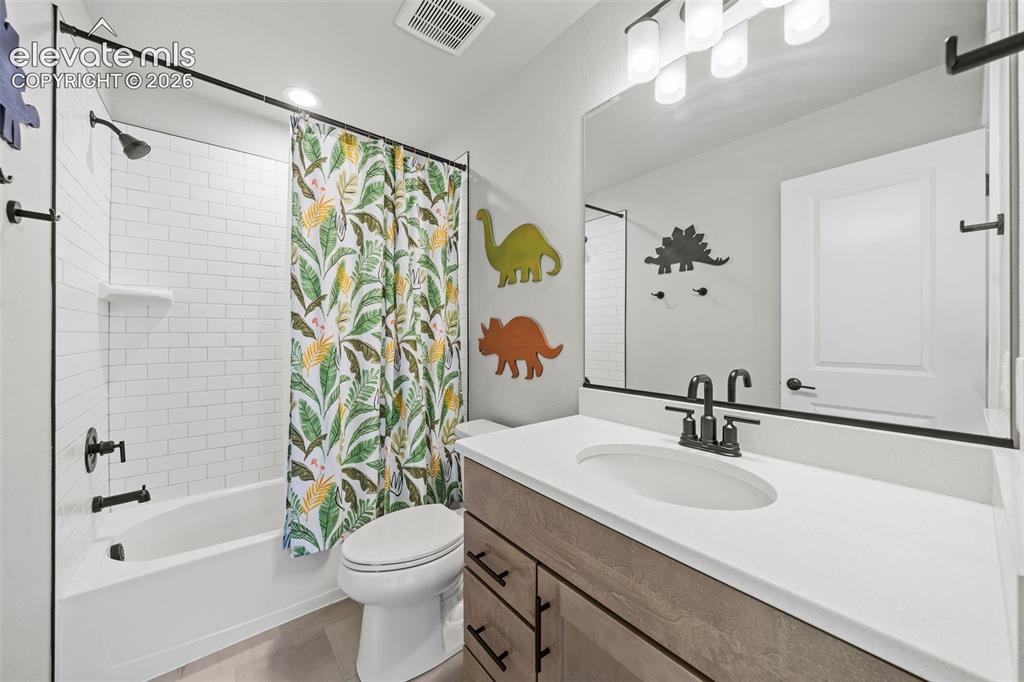 Image 26 of 48: This is the first of two private bathrooms on the upper level.