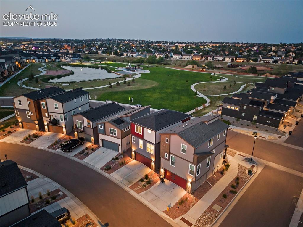 Image 45 of 48: This home (second to the left in this view) has a rear-facing garage and dr