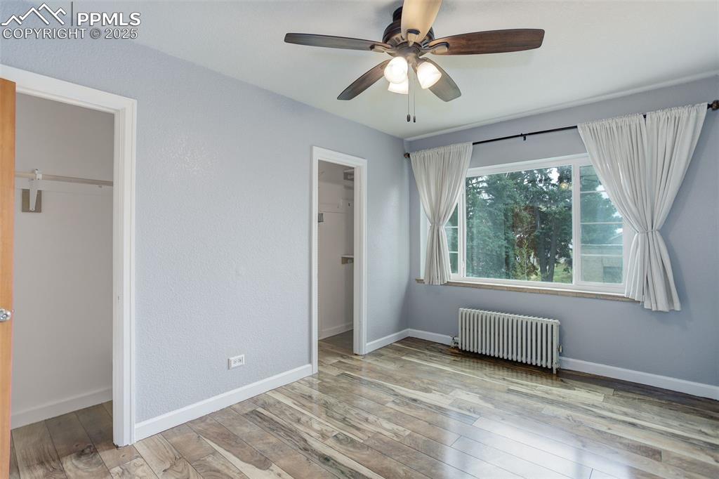 Image 19 of 37: Primary bedroom with two closets