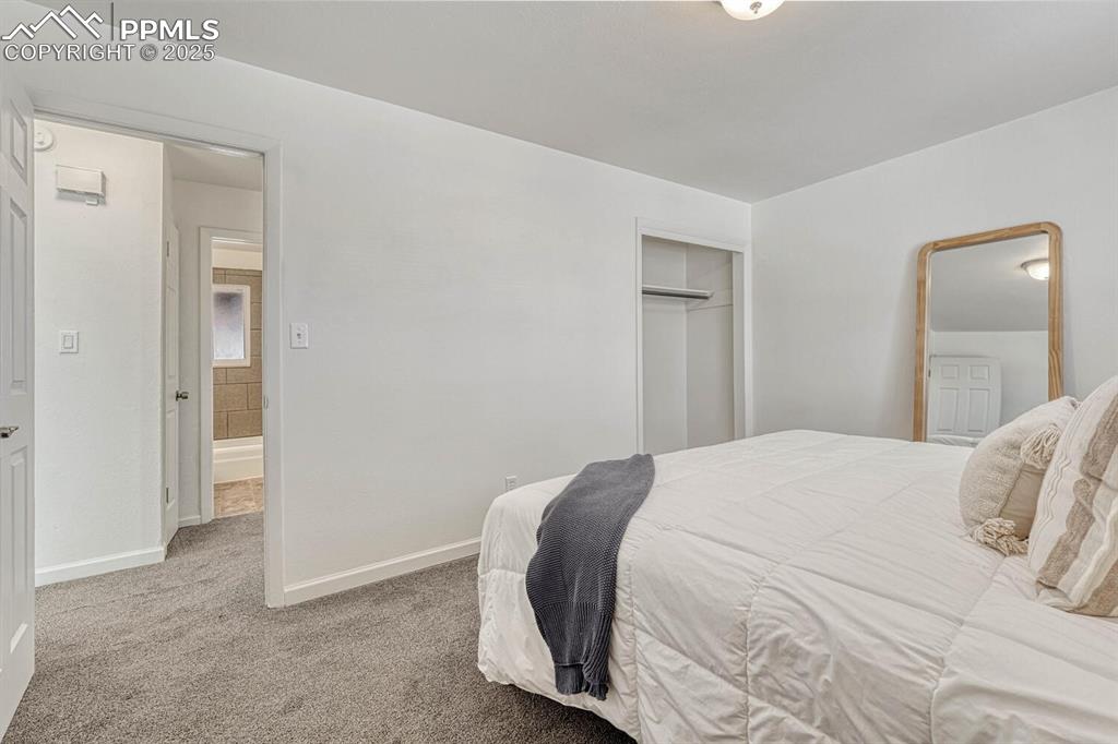 Image 16 of 43: Bedroom featuring carpet floors and a closet