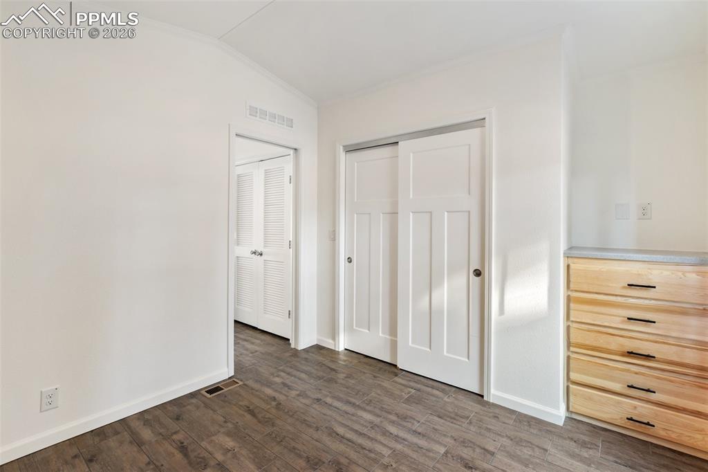 Image 10 of 15: Bedroom, closet and built in. 